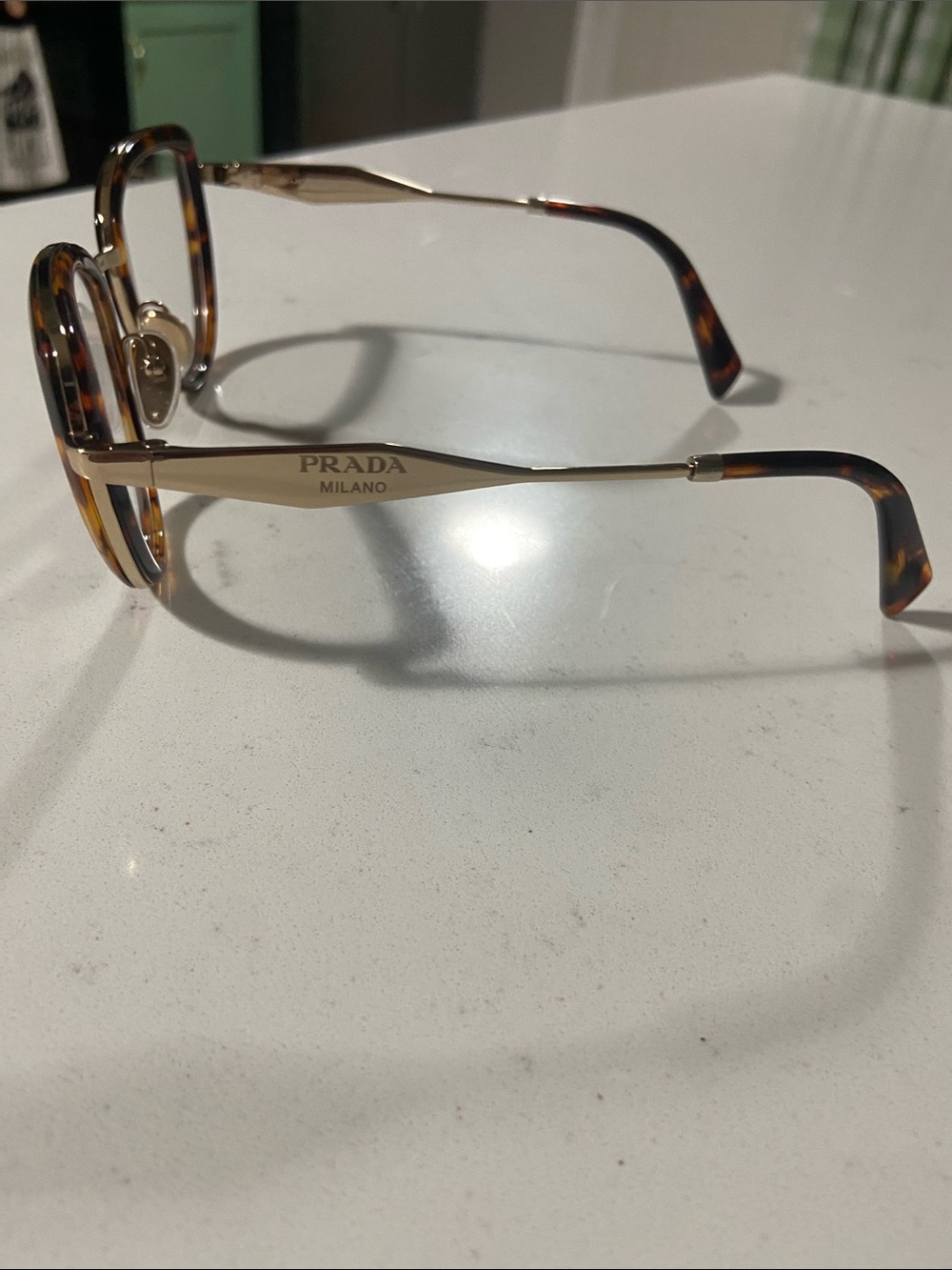 Prada Tortoiseshell Cat-Eye Glasses with Gold Trim - Picture 2 of 4